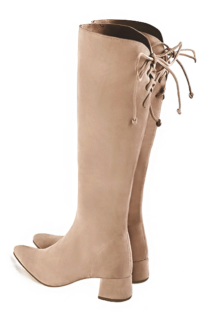 Tan beige women's knee-high boots, with laces at the back. Tapered toe. Low flare heels. Made to measure. Rear view - Florence KOOIJMAN